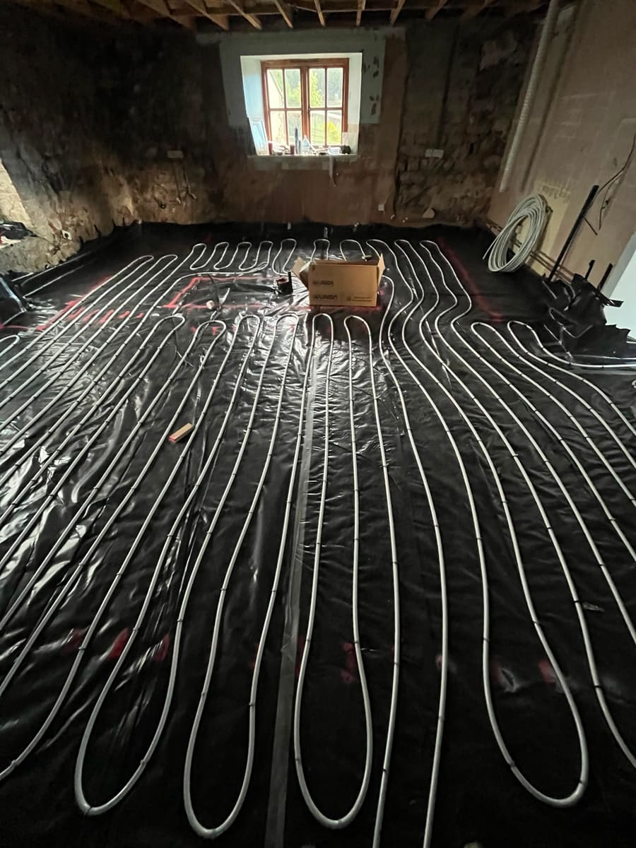 Underfloor heating installation in progress